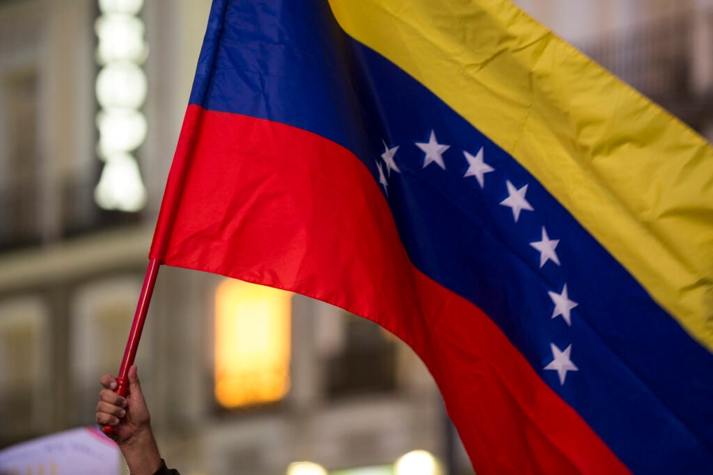 A man from the Venezuelan community living in Madrid holds a