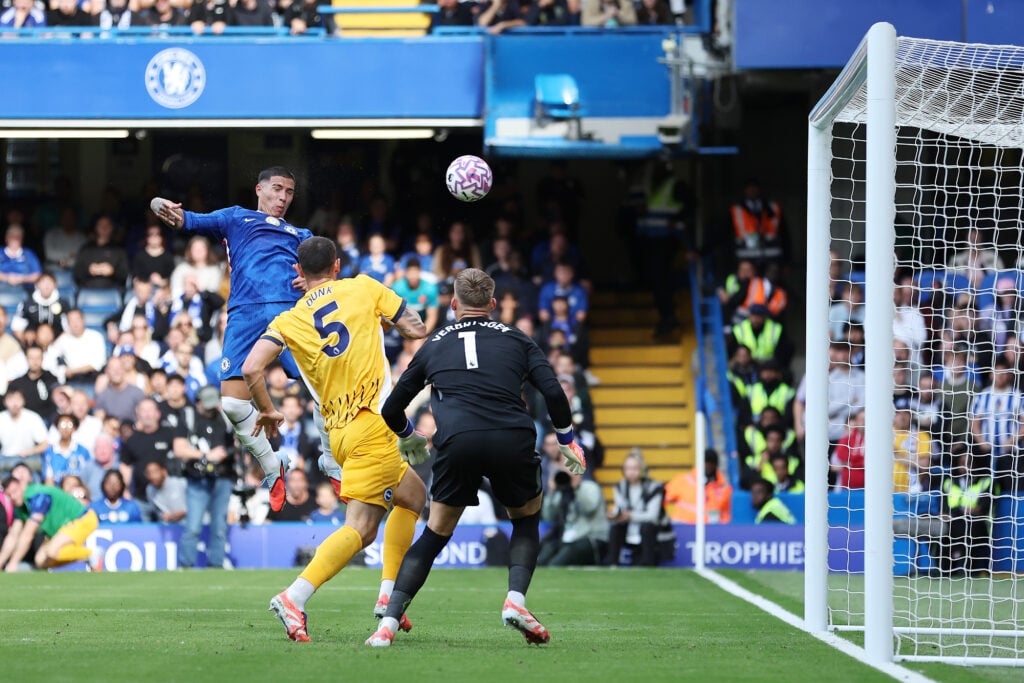 Enzo Fernandez of Chelsea scores his team's first goal past goalkeeper Bart Verbruggen of Brighton