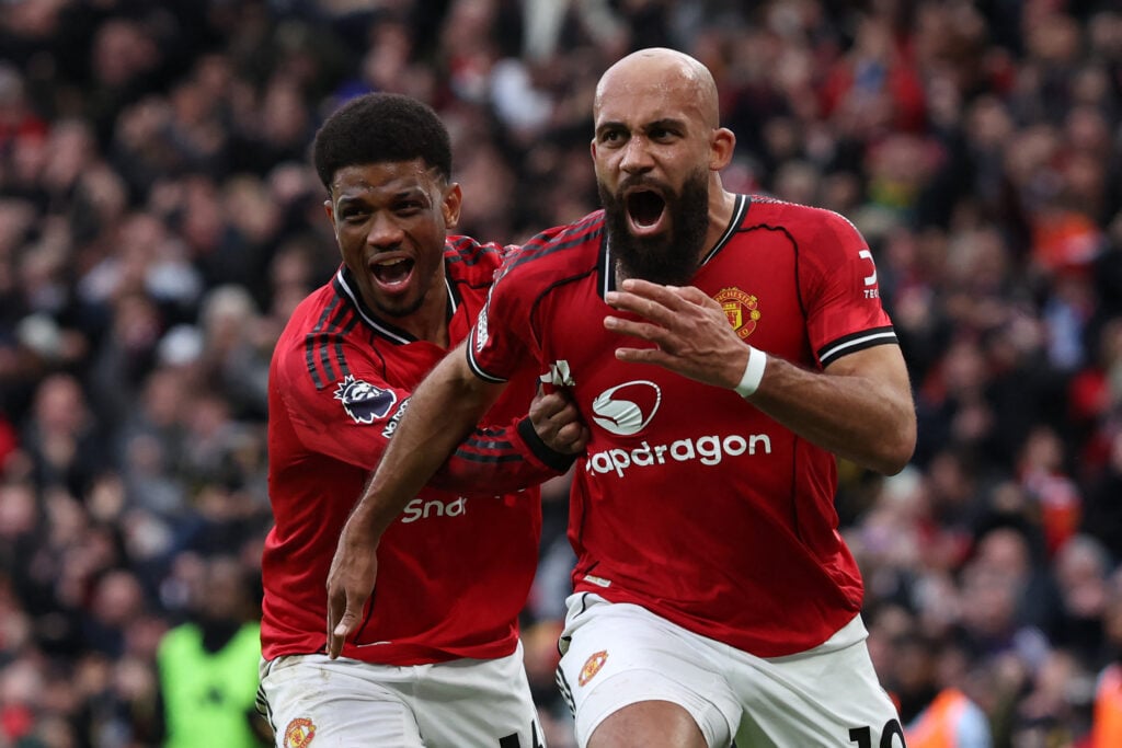 Bryan Mbeumo celebrates with Amad Diallo after scoring during the Premier League match between Manchester United and Manchester City at Old Trafford in Manchester, England, in 2026.