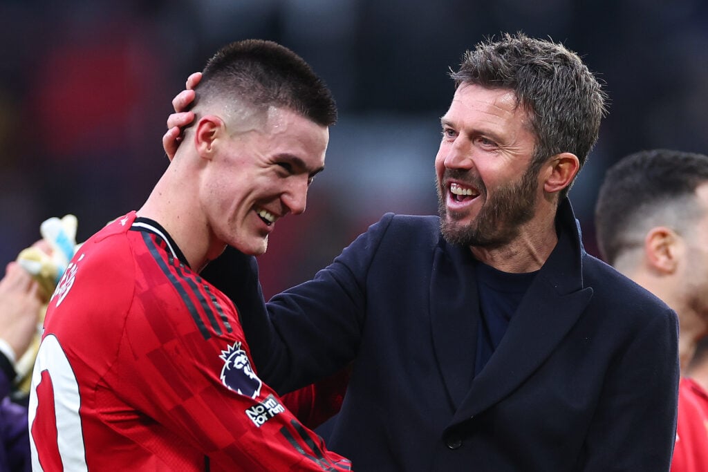 Michael Carrick celebrates with Benjamin Sesko at full time during the Premier League match between Manchester United and Fulham at Old Trafford in 2026 in Manchester, England.