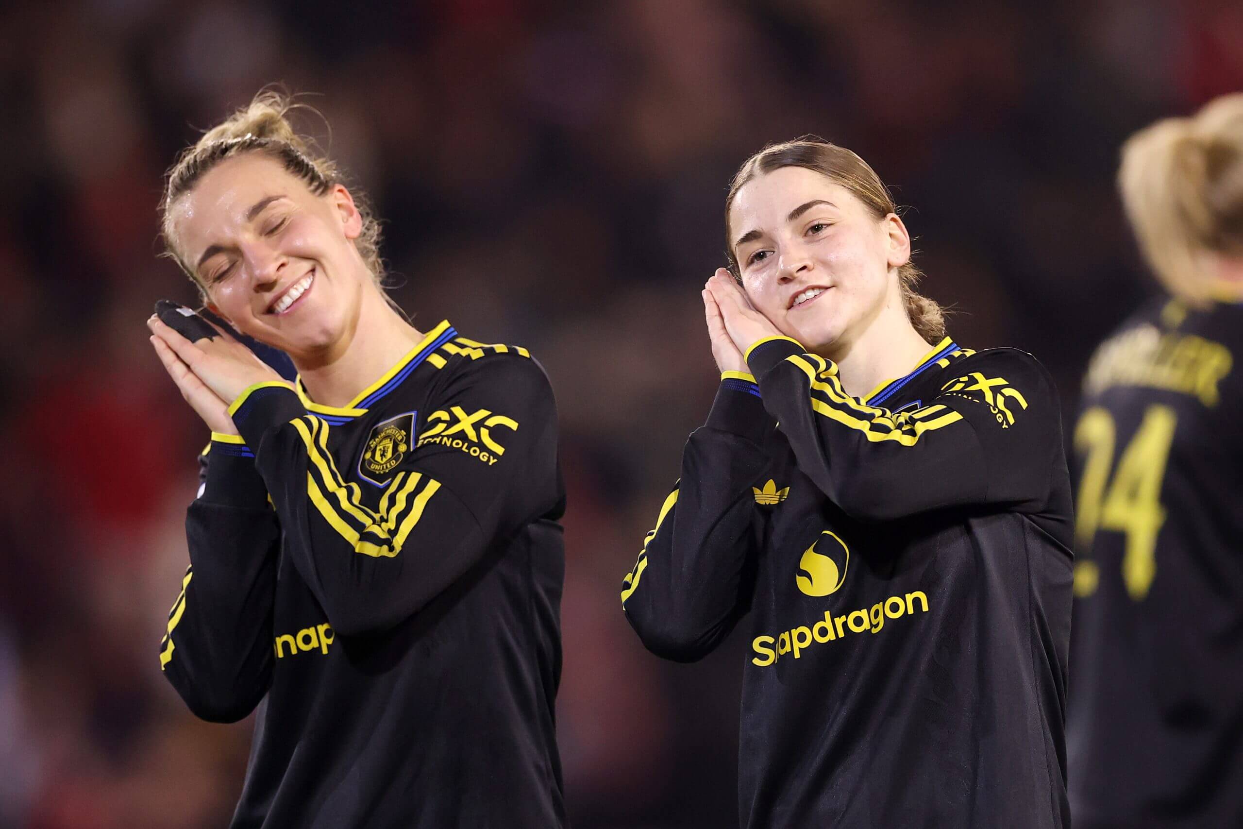 Julia Zigiotti Olme of Manchester United celebrates scoring the first goal against Atletico Madrid with Jess Park