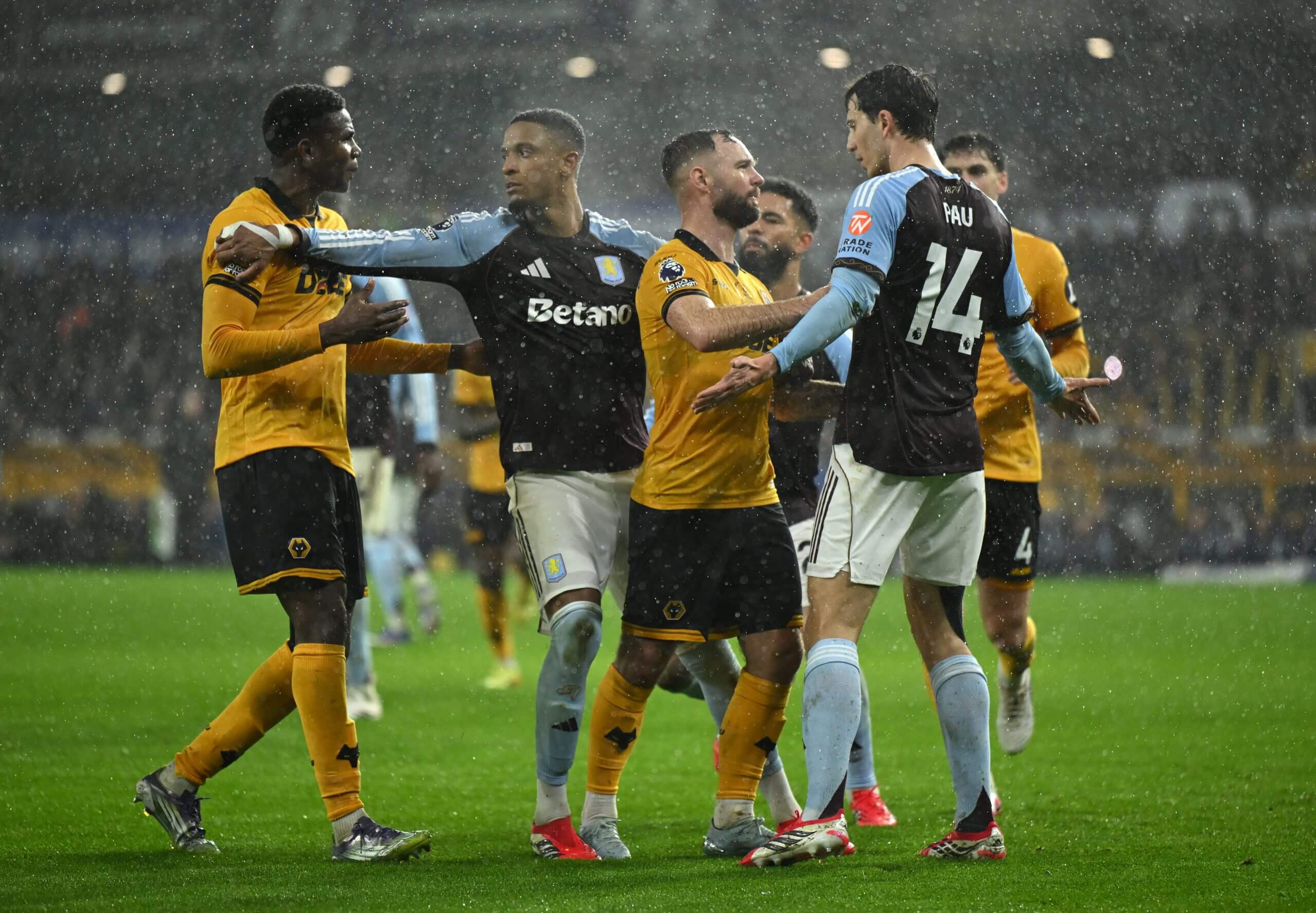 Wolves' Adam Armstrong clashes with Pau Torres of Aston Villa
