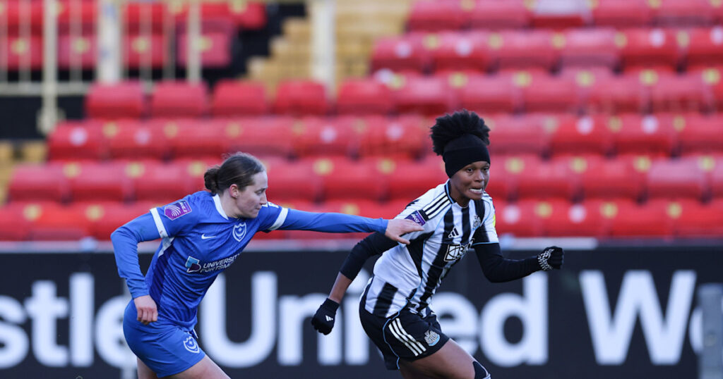 Simone all smiles after making Magpies bow