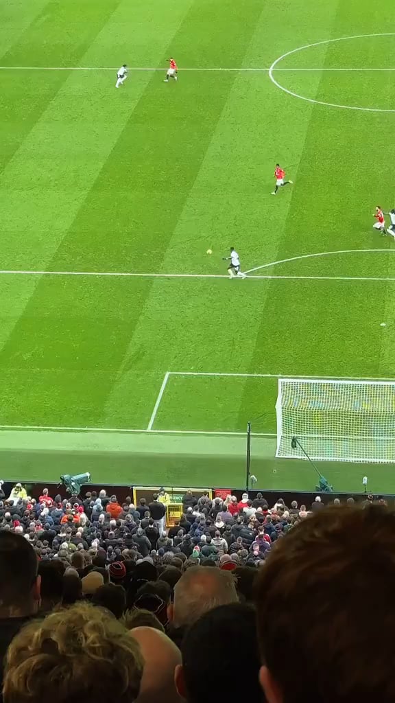 Another angle of Šeško's goal from Stretford End