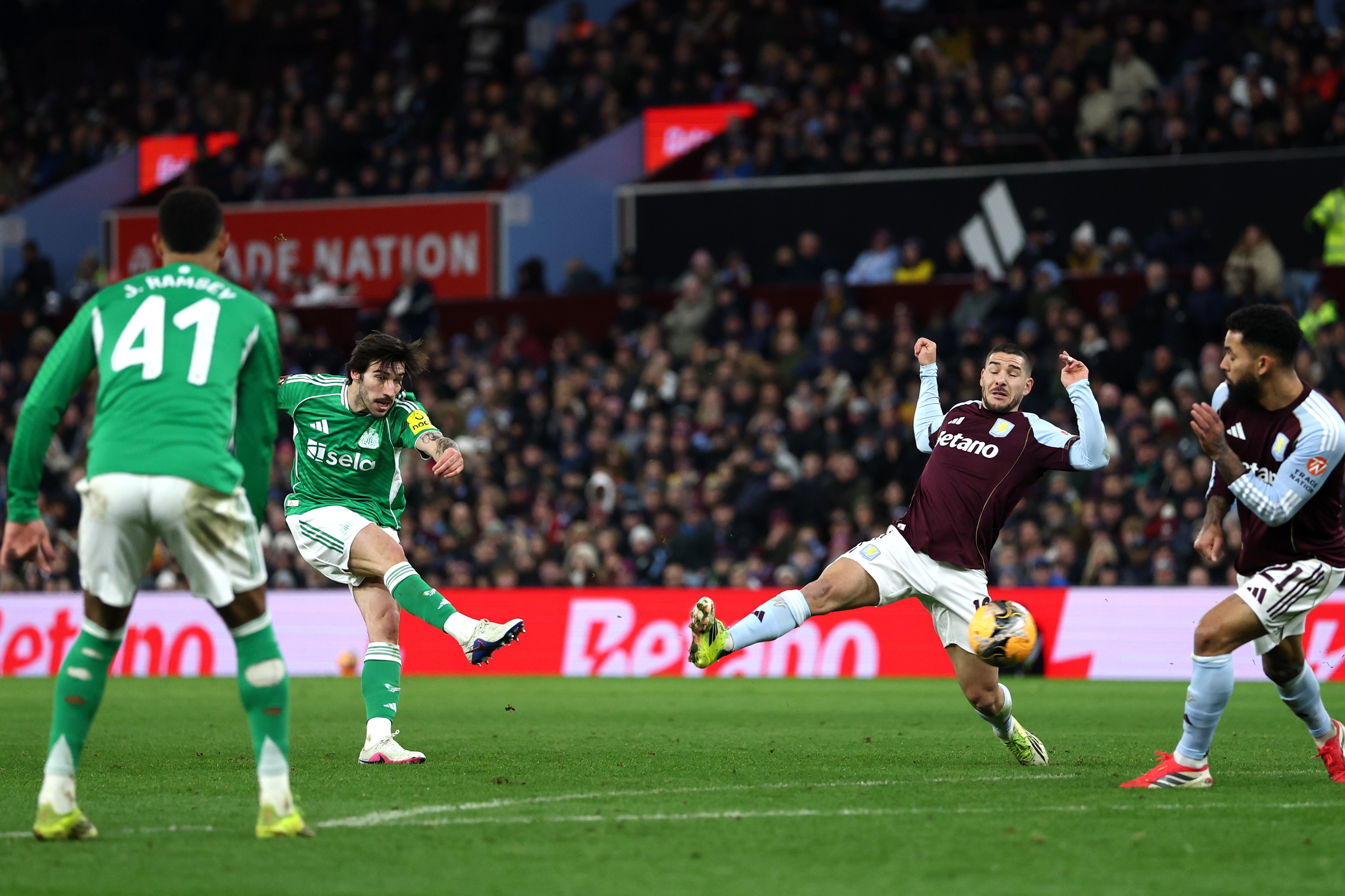 Sandro Tonali of Newcastle United scoring a goal against Aston Villa.