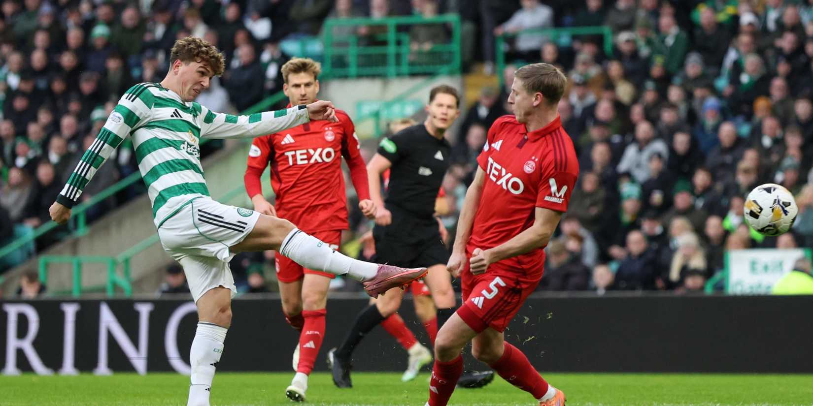 Celtic midfielder Arne Engels takes a shot vs Aberdeen