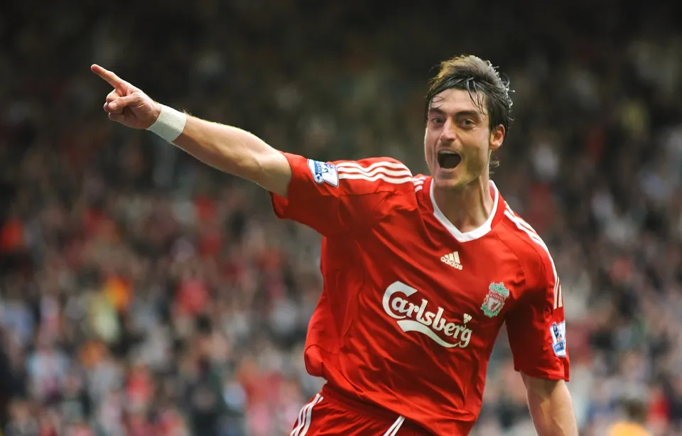 Albert Riera celebrates at Liverpool