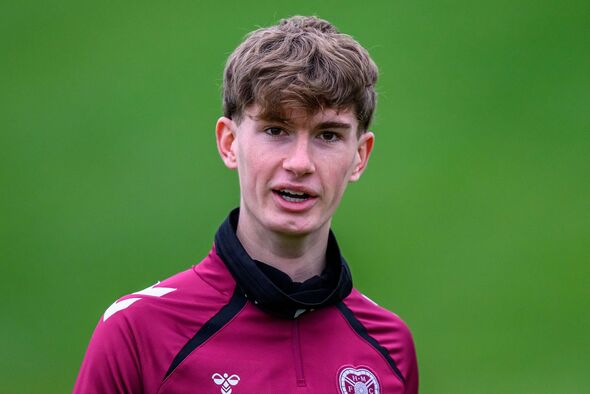 James Wilson looks on