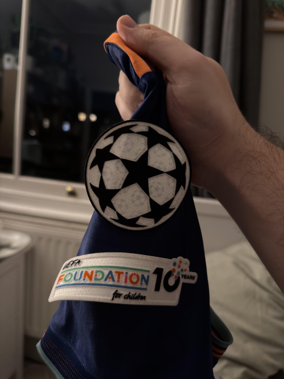Champions League badge peeling off after first time wearing
