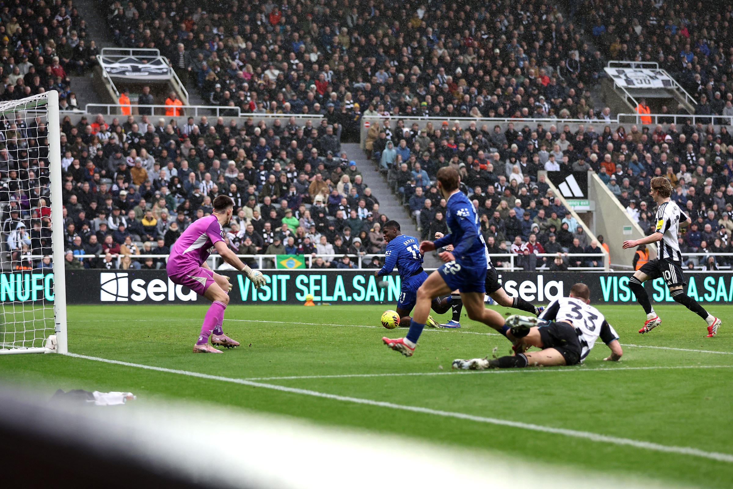 Thierno Barry of Everton scores his team’s third goal past Nick Pope. (Getty Images)