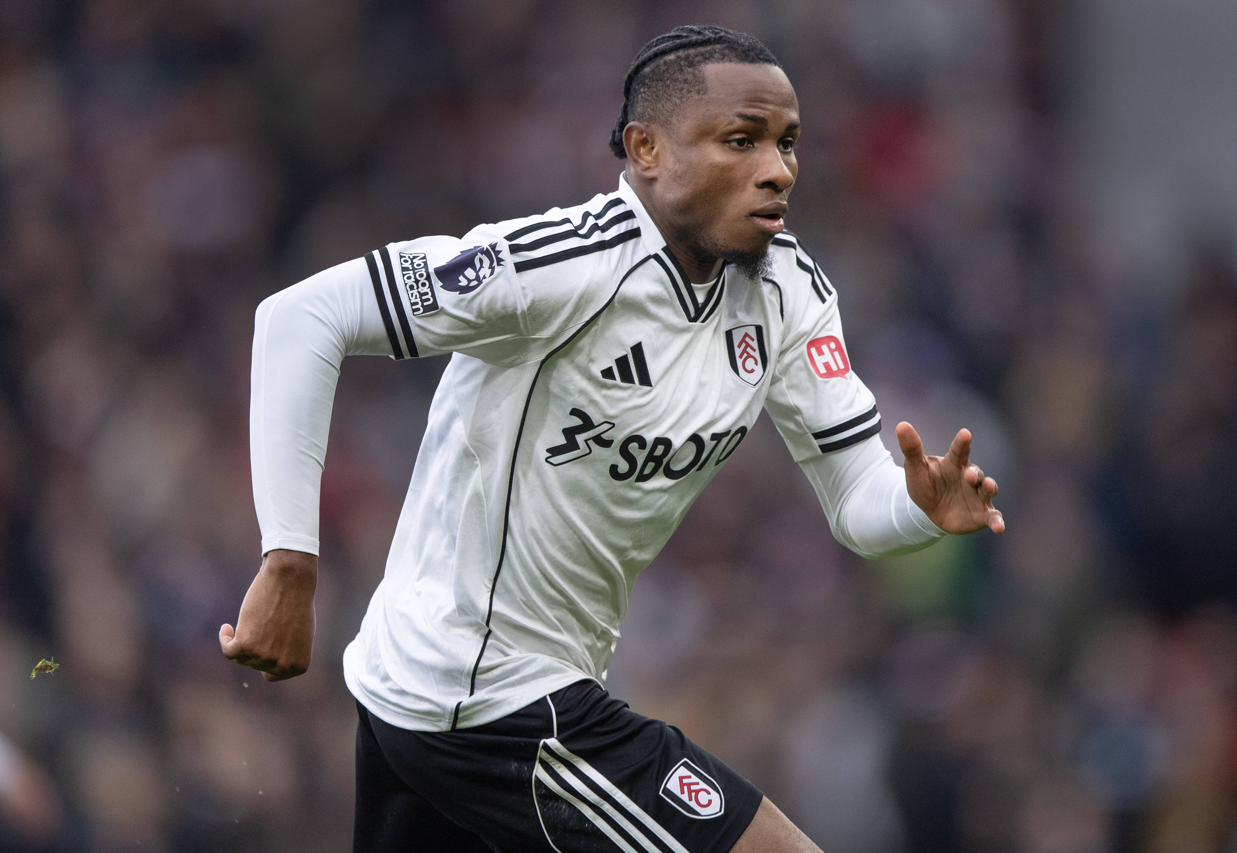 Samuel Chukwueze of Fulham in action during the Premier League match between Manchester United and Fulham
