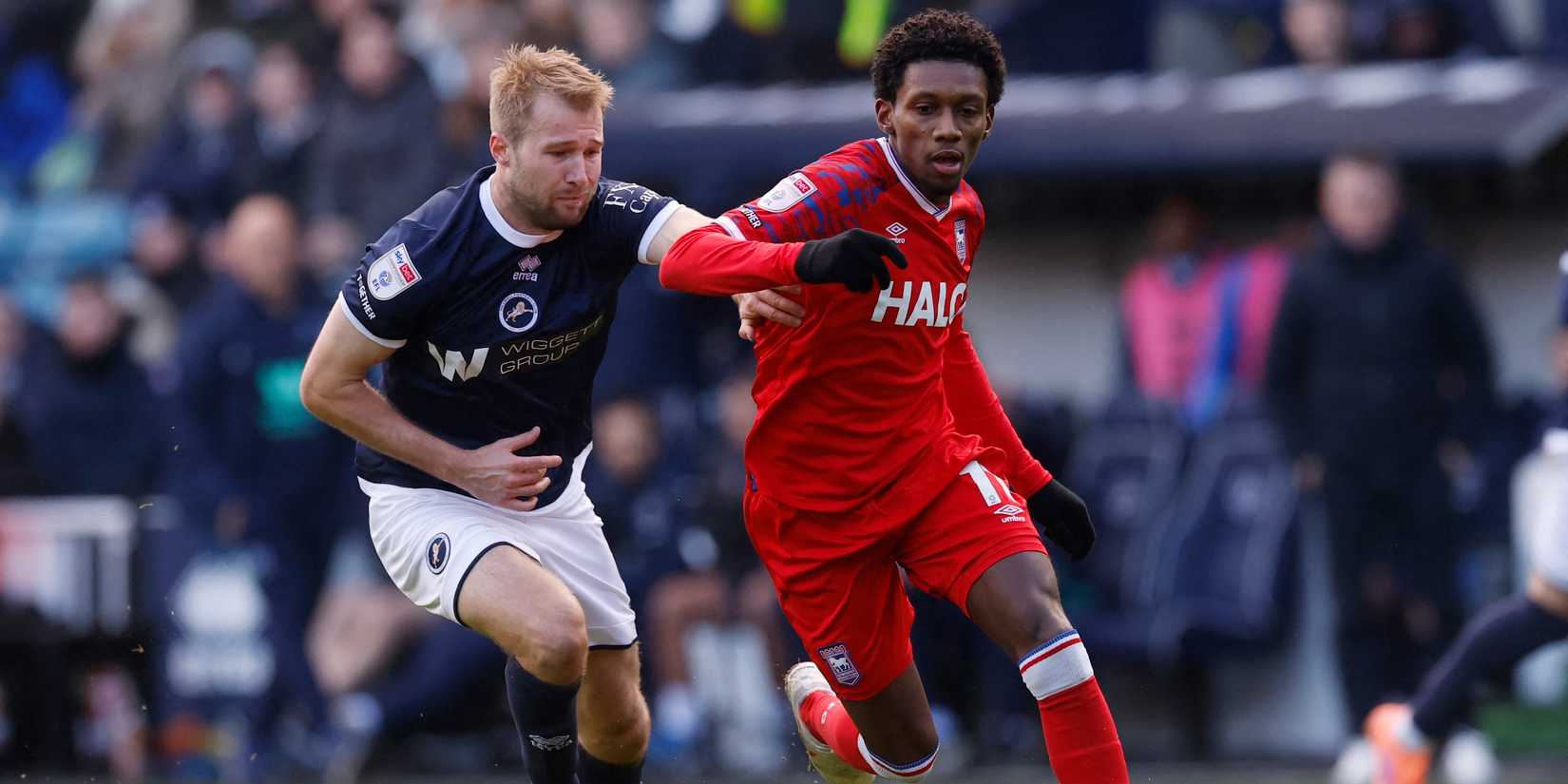 Ipswich Town's Jaden Philogene in action with Millwall's Billy Mitchell