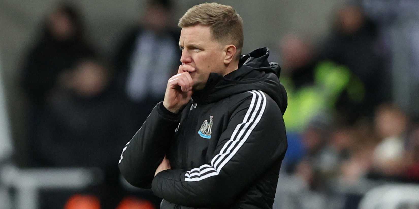 Newcastle United manager Eddie Howe puts his hand to his face.