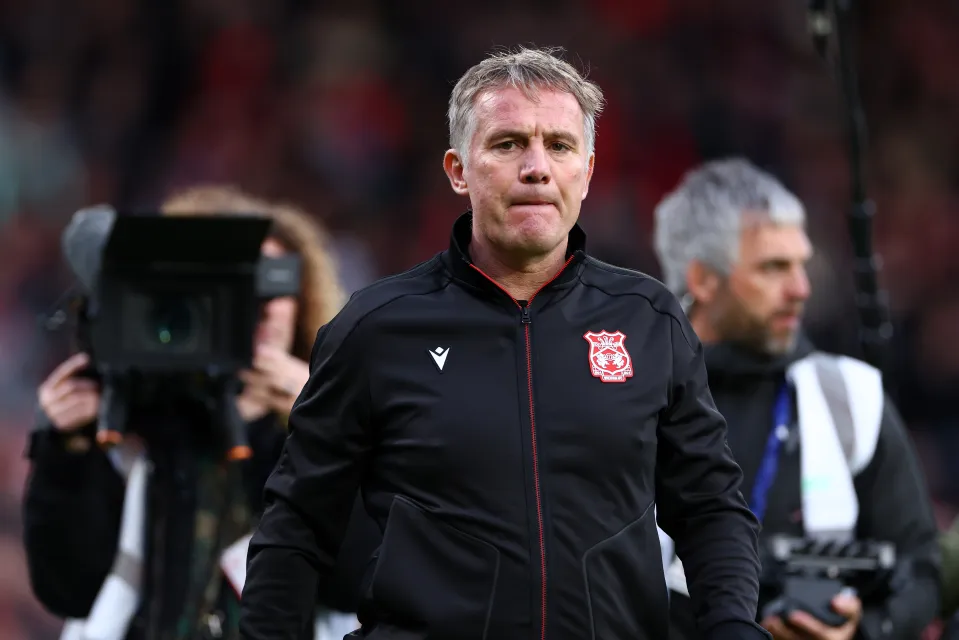 Phil Parkinson looks on during Wrexham's clash against Watford
