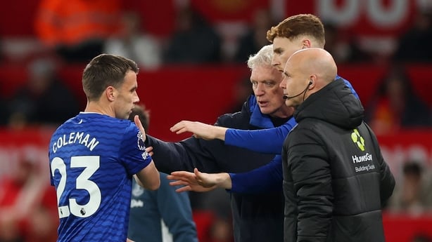 Seamus Coleman of Everton interacts with David Moyes, Manager of Everton, as he is substituted off for team mate Jake O'Brien after sustaining an injury during the Premier League match between Manchester United and Everton at Old Trafford on November 24, 2025 in Manchester, England.