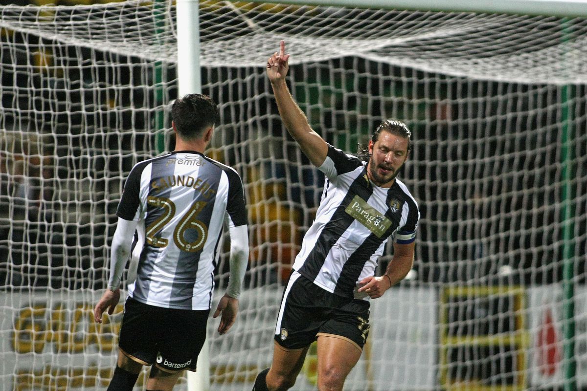 Alan Smith celebrates scoring a goal for Notts County