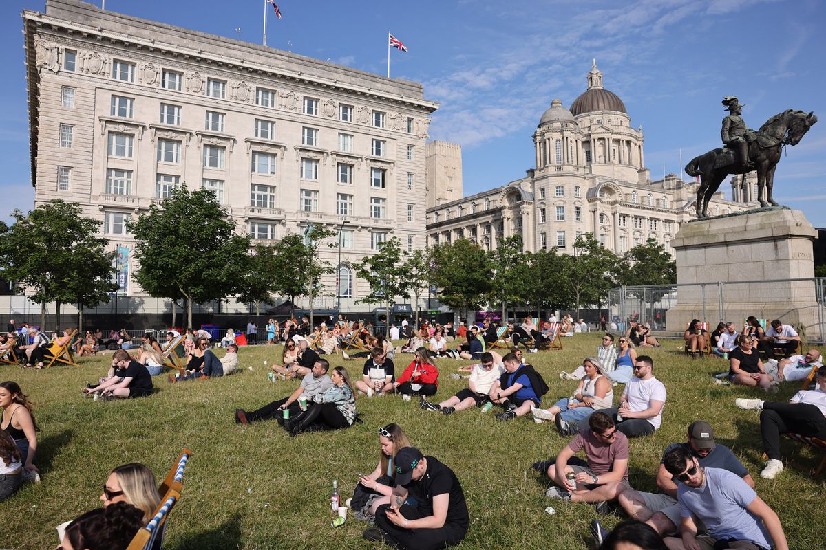 The grass verge opposite the Mersey Ferries terminal is often packed out with people when the sun is shining.