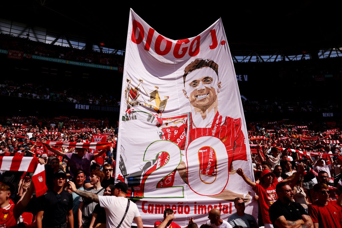 A general view as fans of Liverpool display a banner in tribute to former Liverpool player Diogo Jota
