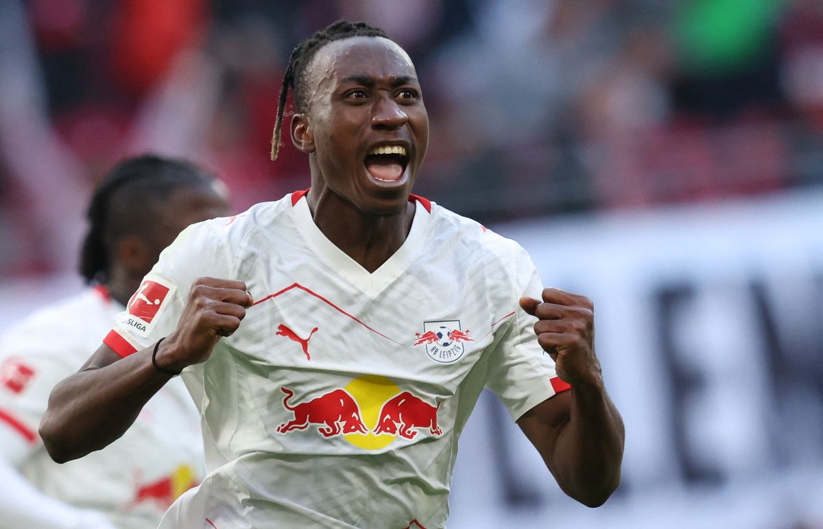 Leipzig's Ivorian forward #49 Yan Diomande celebrates scoring the 1-1 goal during the Bundesliga football match between RB Leipzig and Augsburg