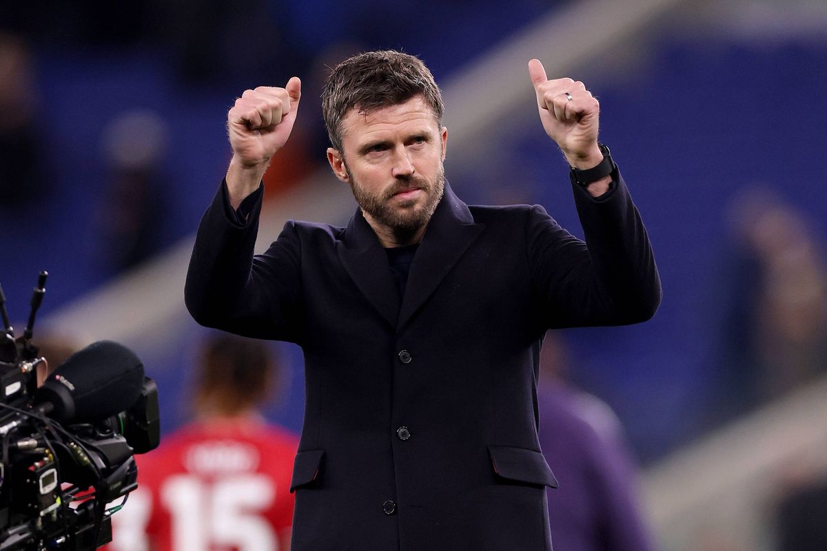 Michael Carrick, Manager of Manchester United, acknowledges the fans following the teams victory in the Premier League match between Everton and Manchester United