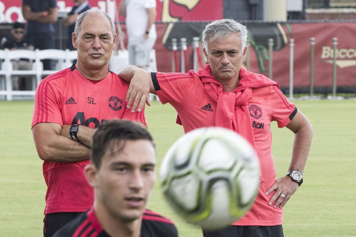 Manchester United Football Club technical coach Silvino Louro, left, and manager Jose Mourinho