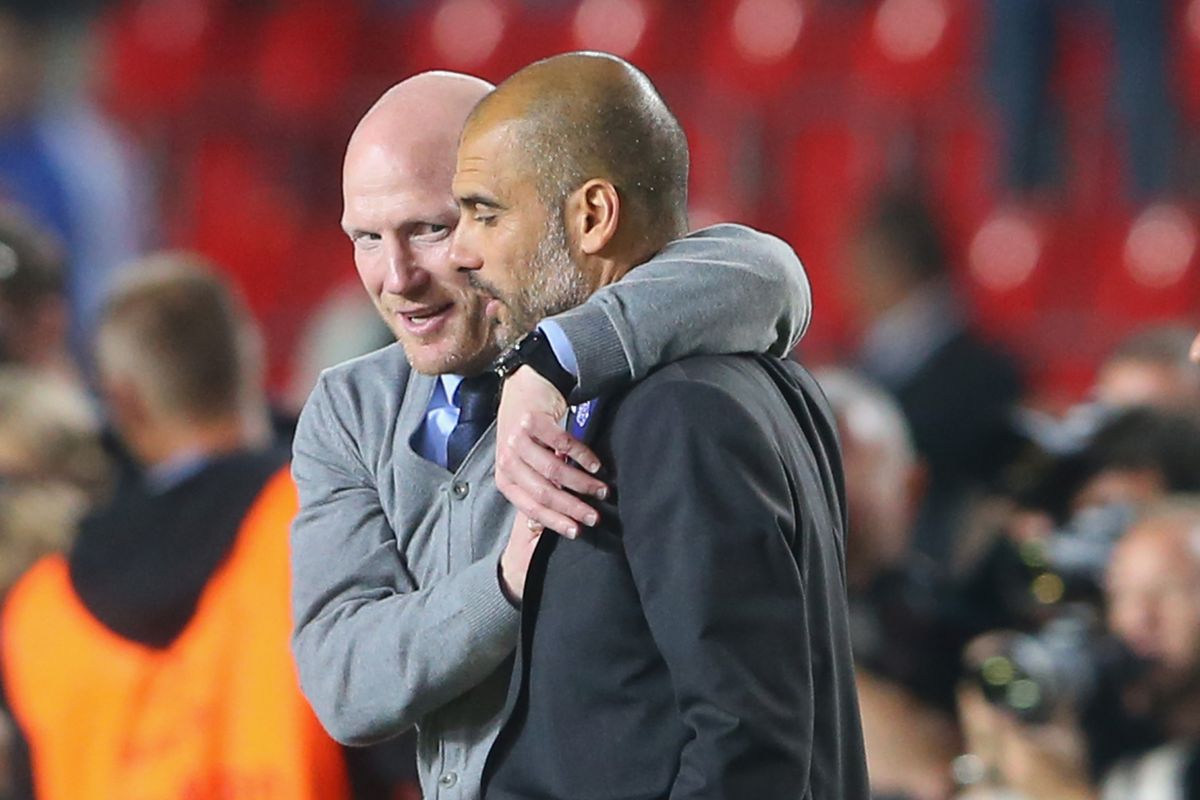 Matthias Sammer, sporting director of Bayern Muenchen, celebrates with head coach Pep Guardiola after winning the UEFA Super Cup between FC Bayern Muenchen and Chelsea FC at Stadion Eden on August 30, 2013