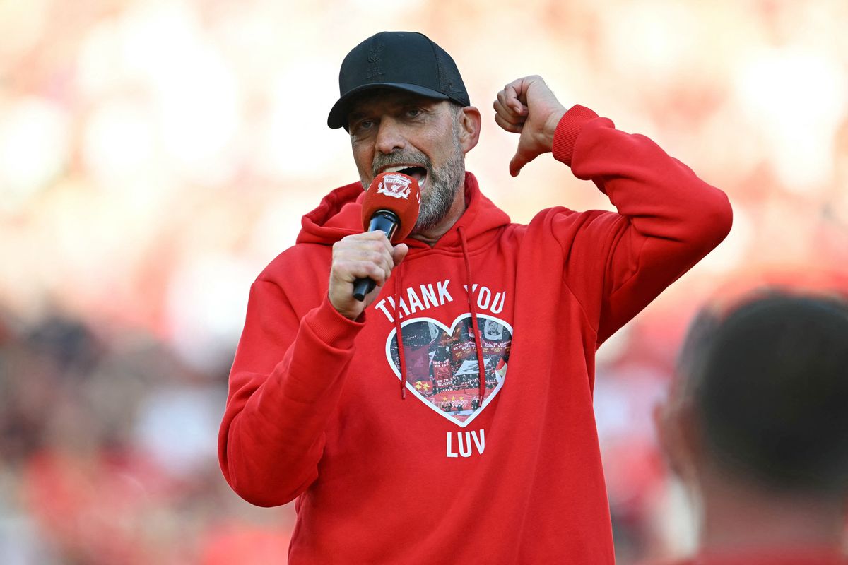 Liverpool's German manager Jurgen Klopp speaks as he makes his final farewell to fans after the English Premier League football match between Liverpool and Wolverhampton Wanderers at Anfield in Liverpool, north west England on May 19, 2024. Jurgen Klopp was given a heartfelt reception by home fans at Anfield as he walked out for his final match as Liverpool manager on Sunday. Klopp, who arrived at the club in October 2015, won seven major trophies at Liverpool, including the club's first league title for 30 years and the 2019 Champions League. (Photo by Paul ELLIS / AFP) / RESTRICTED TO EDITORIAL USE. No use with unauthorized audio, video, data, fixture lists, club/league logos or 'live' services. Online in-match use limited to 120 images. An additional 40 images may be used in extra time. No video emulation. Social media in-match use limited to 120 images. An additional 40 images may be used in extra time. No use in betting publications, games or single club/league/player publications. /  (Photo by PAUL ELLIS/AFP via Getty Images)