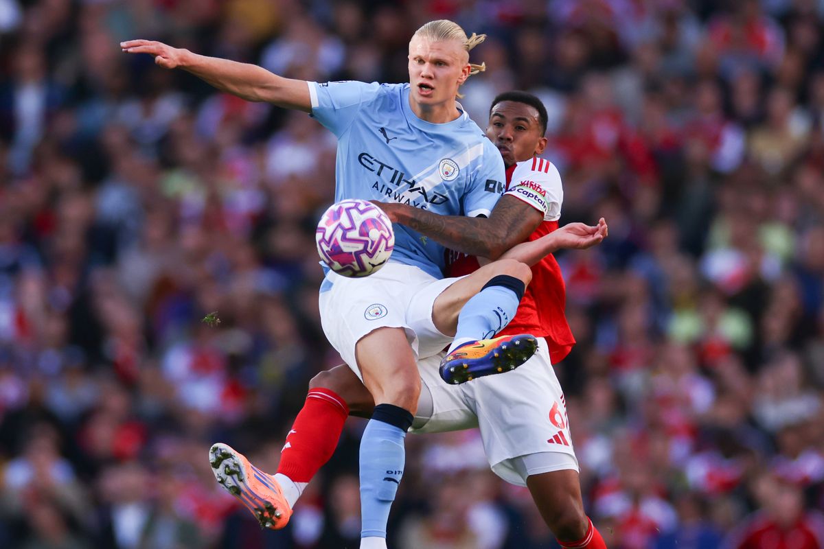 Erling Haaland and Gabriel battle for possession during Manchester City's last clash with Arsenal