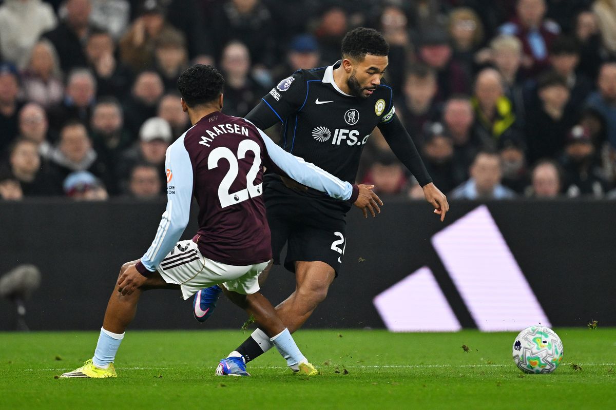 Reece James of Chelsea on the ball whilst under pressure from Ian Maatsen of Aston Villa during the Premier League match between Aston Villa and Chelsea at Villa Park on March 04, 2026 in Birmingham, England