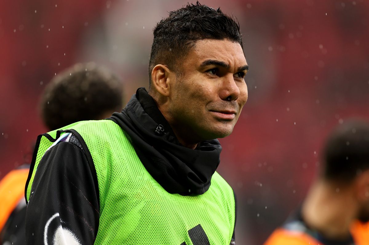 Manchester United's Casemiro reacts to the rain during the pre-match warm-up before the Premier League match between Manchester United and Aston Villa at Old Trafford on March 15, 2026 in Manchester, United Kingdom.