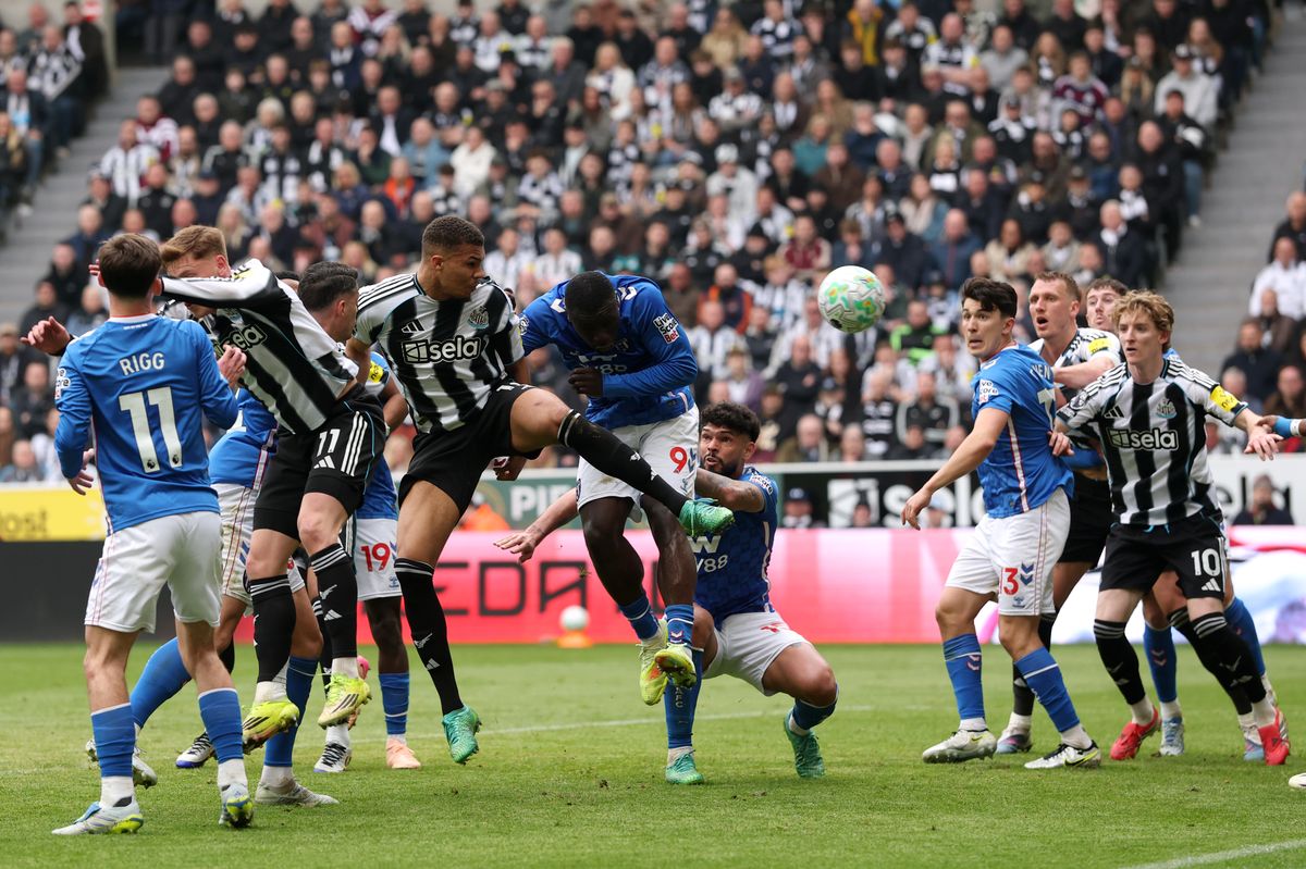 Malick Thiaw winning a header