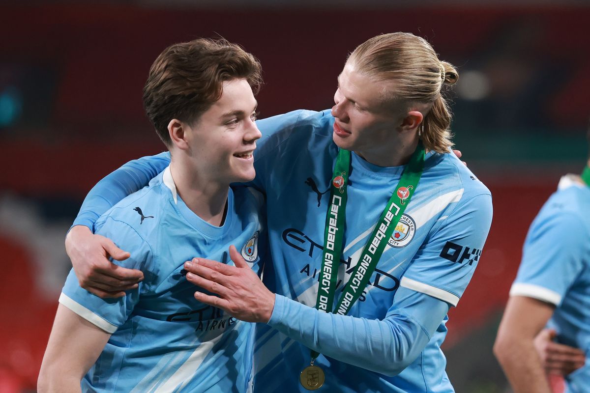 Erling Haaland and Sverre Nypan of Manchester City celebrate after  the Carabao Cup final match Arsenal and between Manchester City at Wembley Stadium 