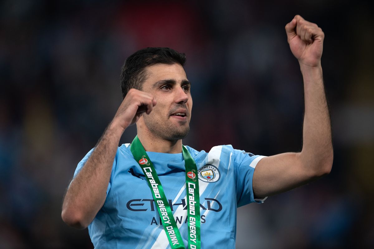Rodri of Manchester City celebrates to the fans following the Carabao Cup Final match Arsenal and between Manchester City at Wembley Stadium 