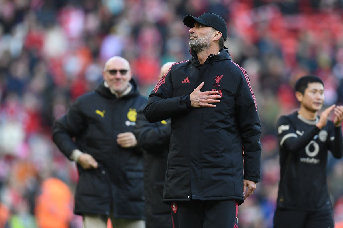 Liverpool Legends' manager Jurgen Klopp gestures to fans