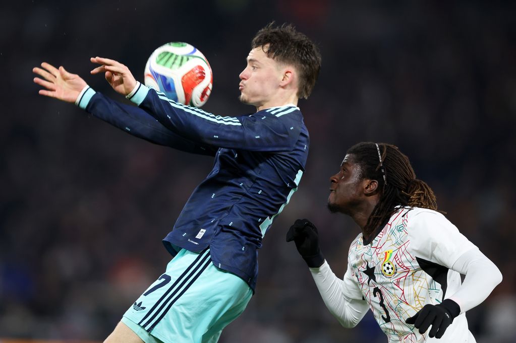 Florian Wirtz of Germany vies with Caleb Yirenkyi of Ghana during the international friendly match between Germany and Ghana at MHP Arena on March 30, 2026 in Ludwigsburg, Germany