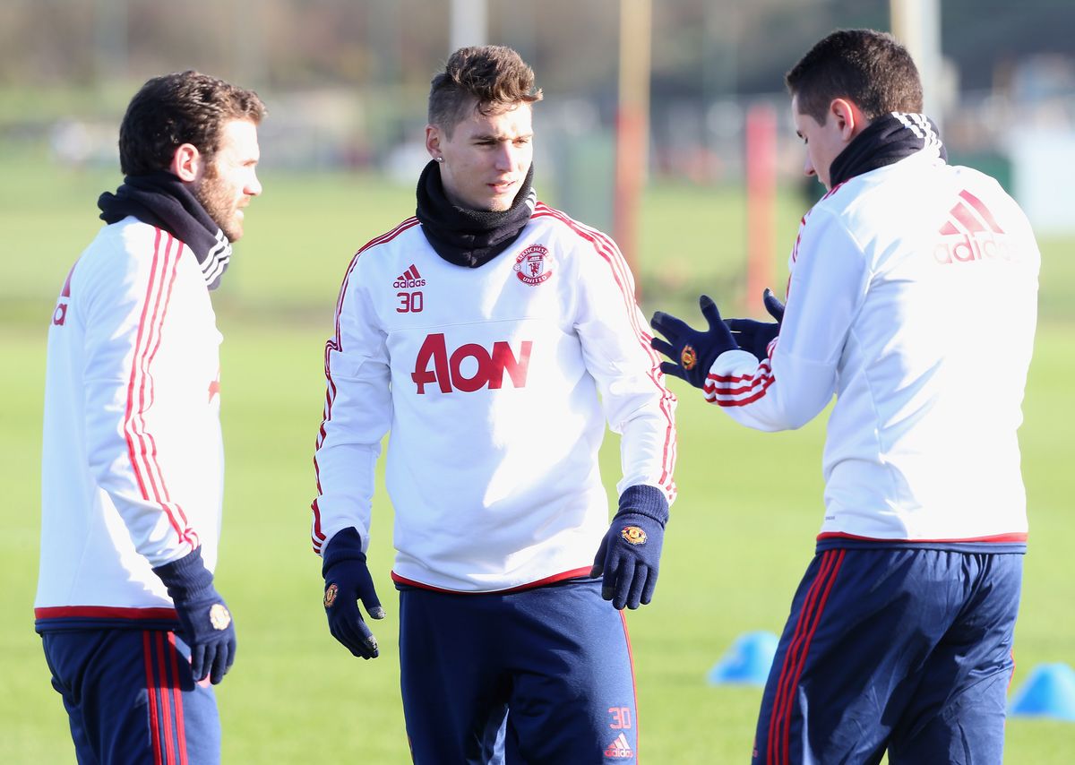 Juan Mata, Guillermo Varela and Ander Herrera of Manchester United in action during a first team training session at Aon Training Complex on January 22, 2016 in Manchester, England. 