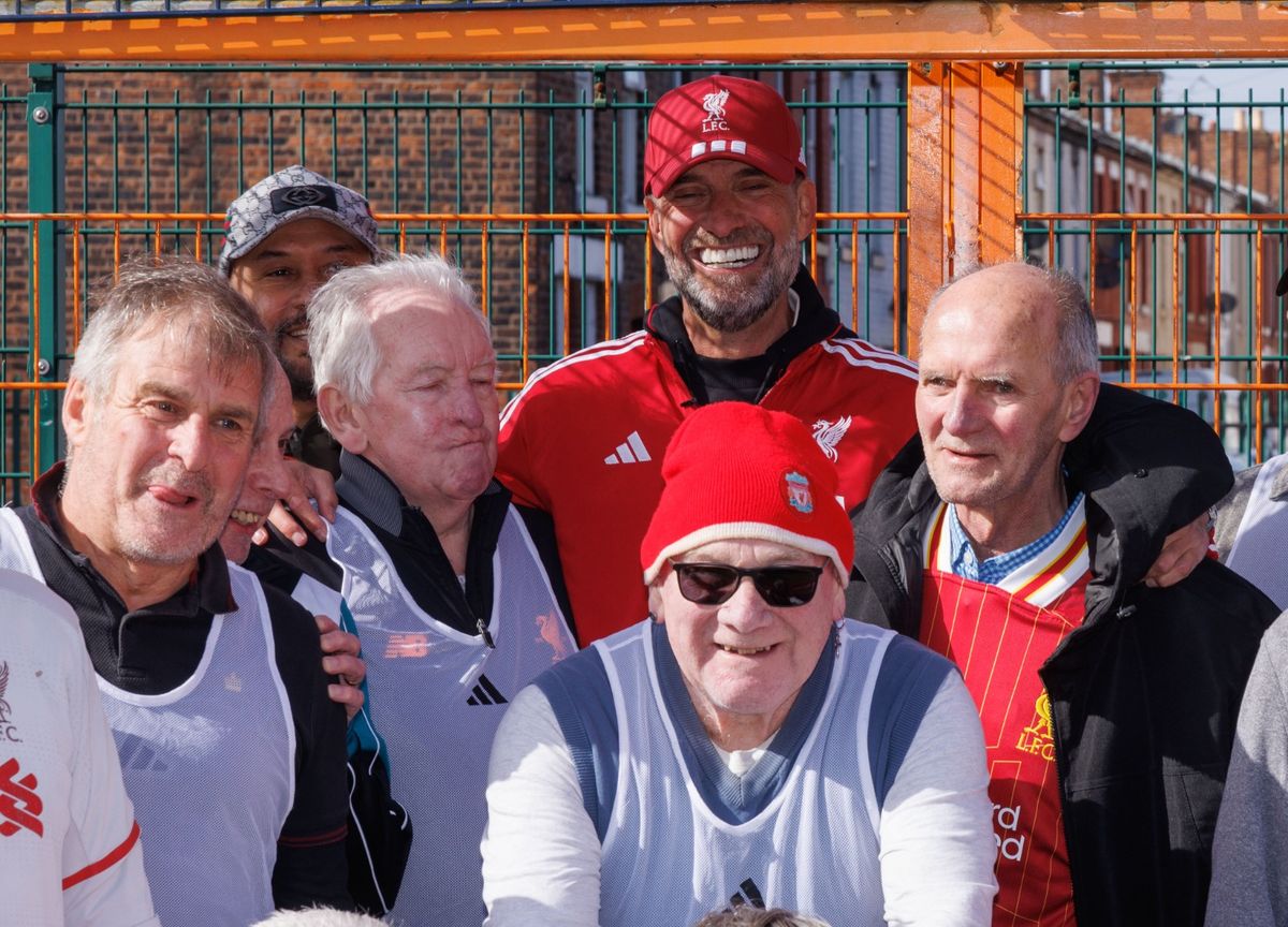 Jurgen Klopp meets walking footballers who play as part of the LFC Foundation's programme at Anfield Sports & Community Centre