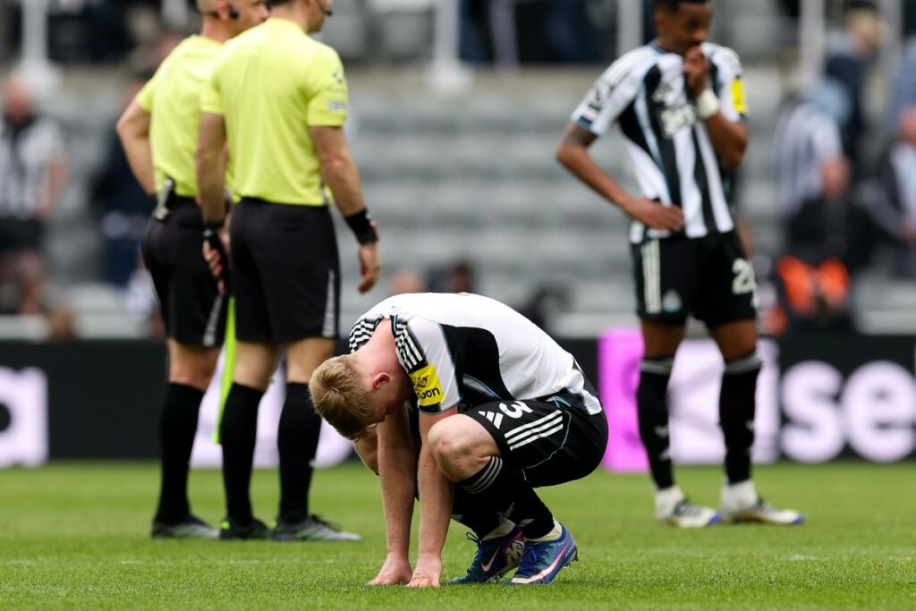 Newcastle United's Lewis Hall reacts at the end of the defeat to Sunderland