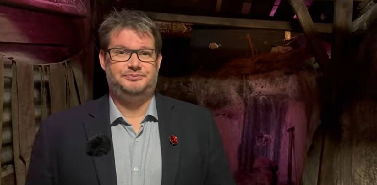 Jim Butler teaches history from the museum's WWII trench. Image via Jim Butler. 