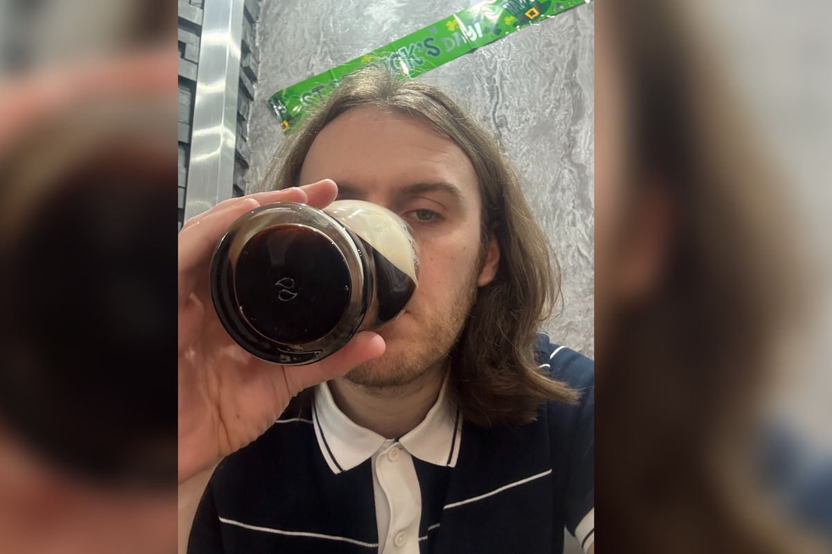 Drinking a pint of Guinness in Ava's Bar