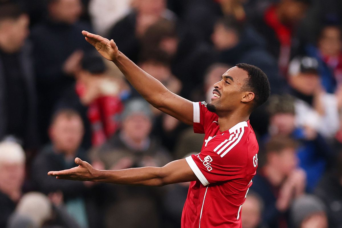 Ryan Gravenberch of Liverpool celebrates scoring his team's first goal during the Premier League match between Liverpool and Wolverhampton Wanderers 