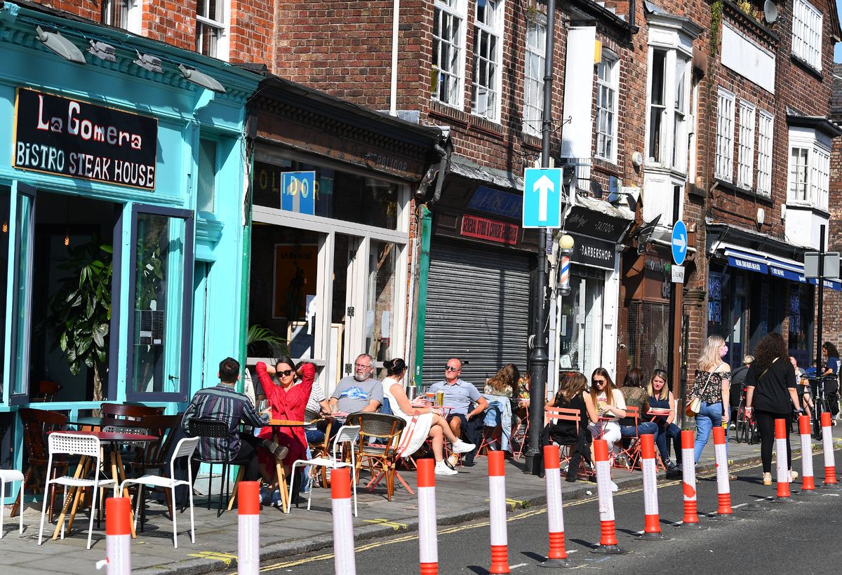 When the sun is shining, you will struggle to find a table without people sitting on it along Lark Lane.