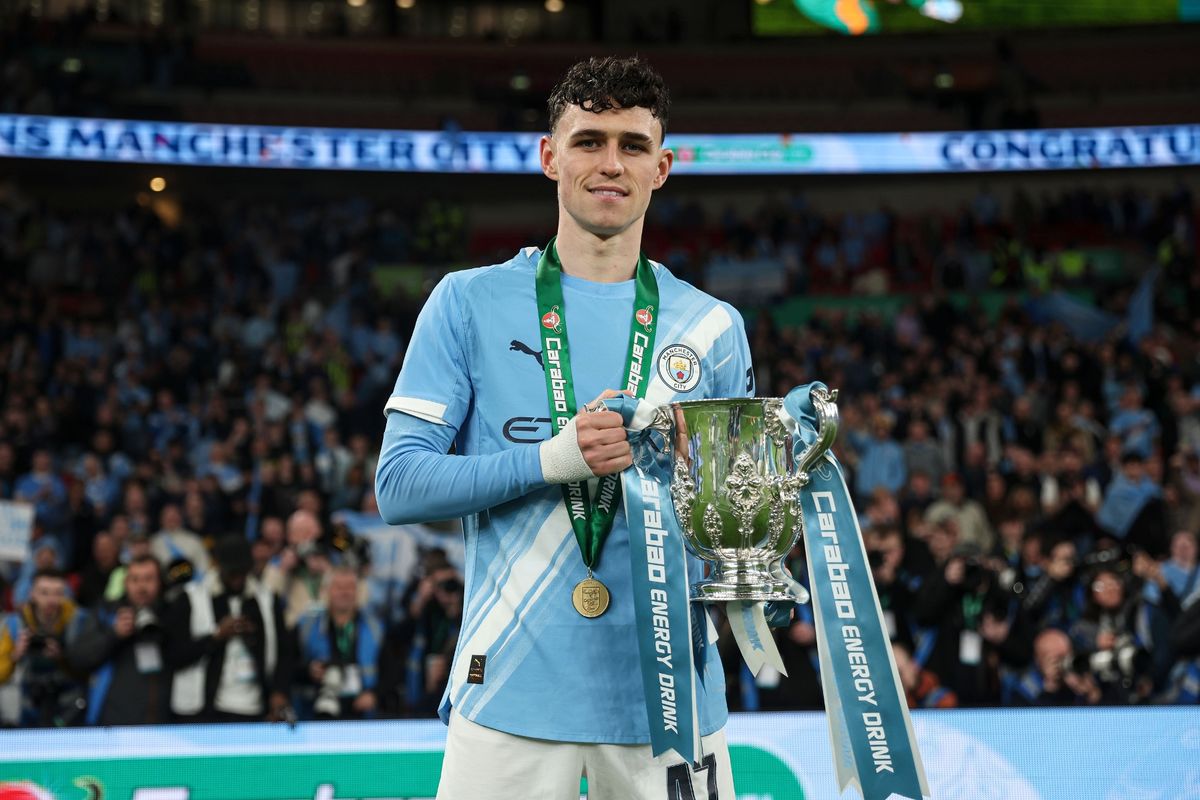 Phil Foden celebrates winning the 2025/26 Carabao Cup with Manchester City