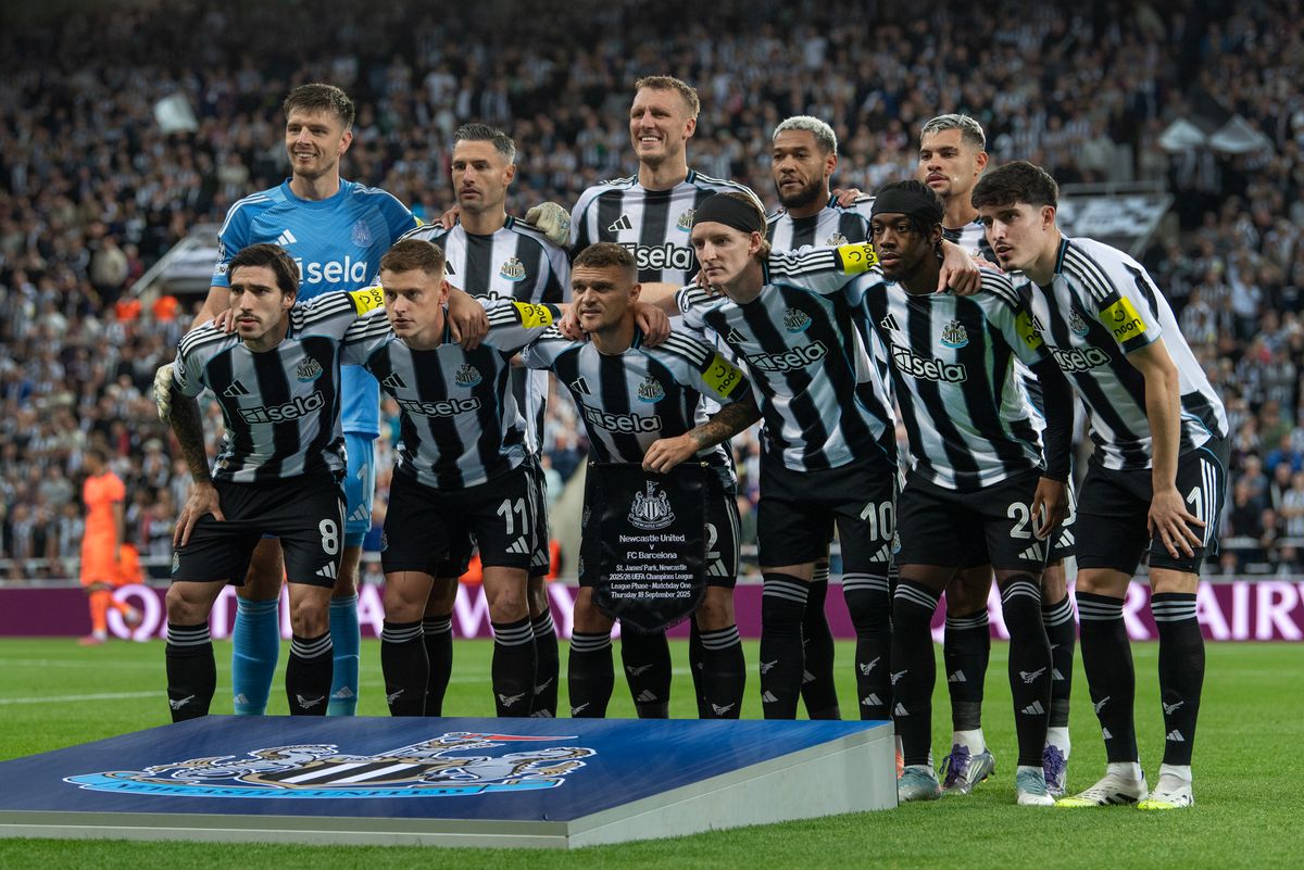 The Newcastle United team line up ahead of the UEFA Champions League match with Barcelona