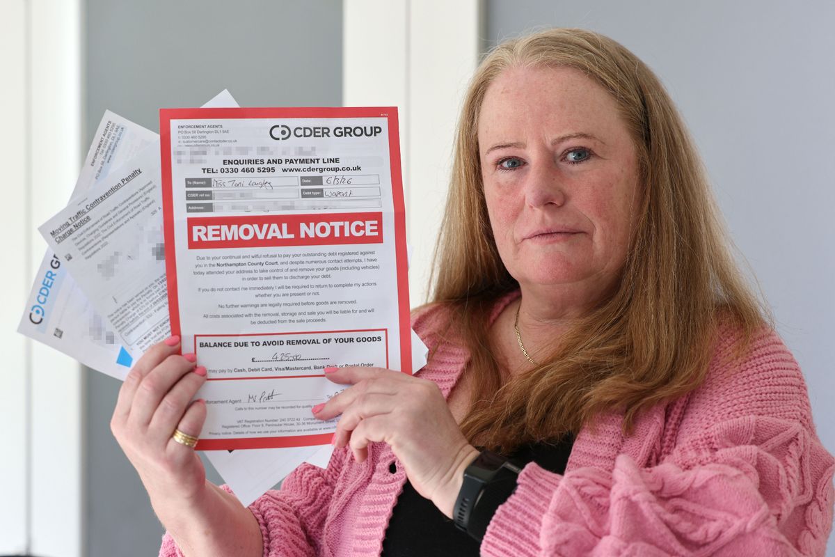 Toni Langley and the parking fines issued to local residents in Woolton near the local school enforcement cameras. Photo by Colin Lane