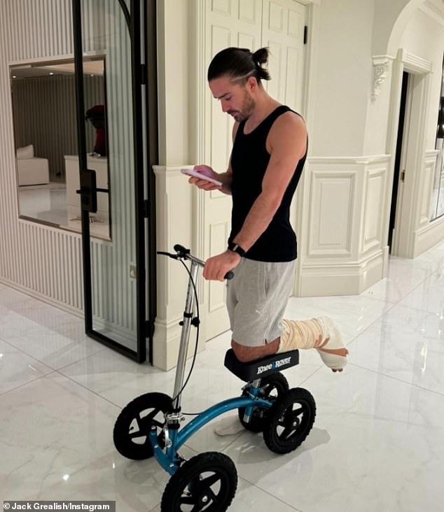Jack Grealish is using a knee stool to rest his injured left foot after surgery last month