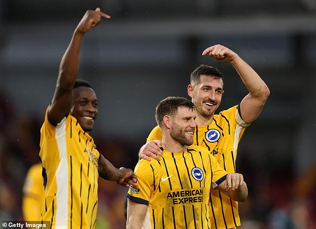 Milner's team-mates Danny Welbeck (left) and Lewis Dunk shower him with praise after making his 654th top-flight appearance in a win at Brentford