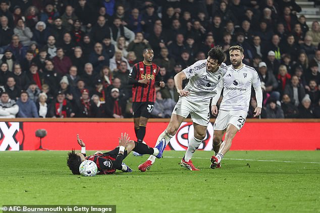 Moments later, Harry Maguire tumbled Evanilson - but he was punished for it with a red card and a penalty against Man United