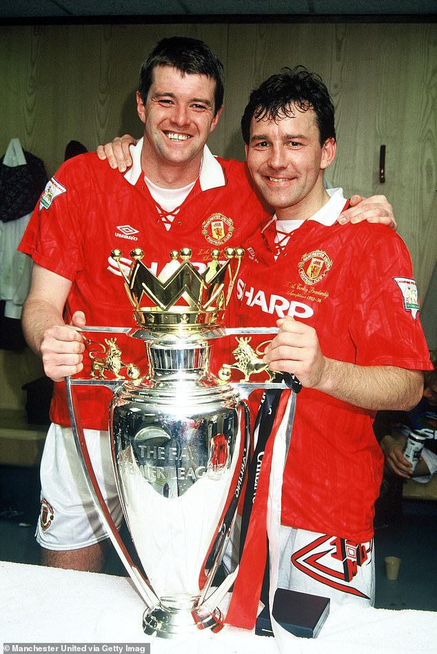 Robson, with Gary Pallister in 1994, won two league titles and three FA Cups with United