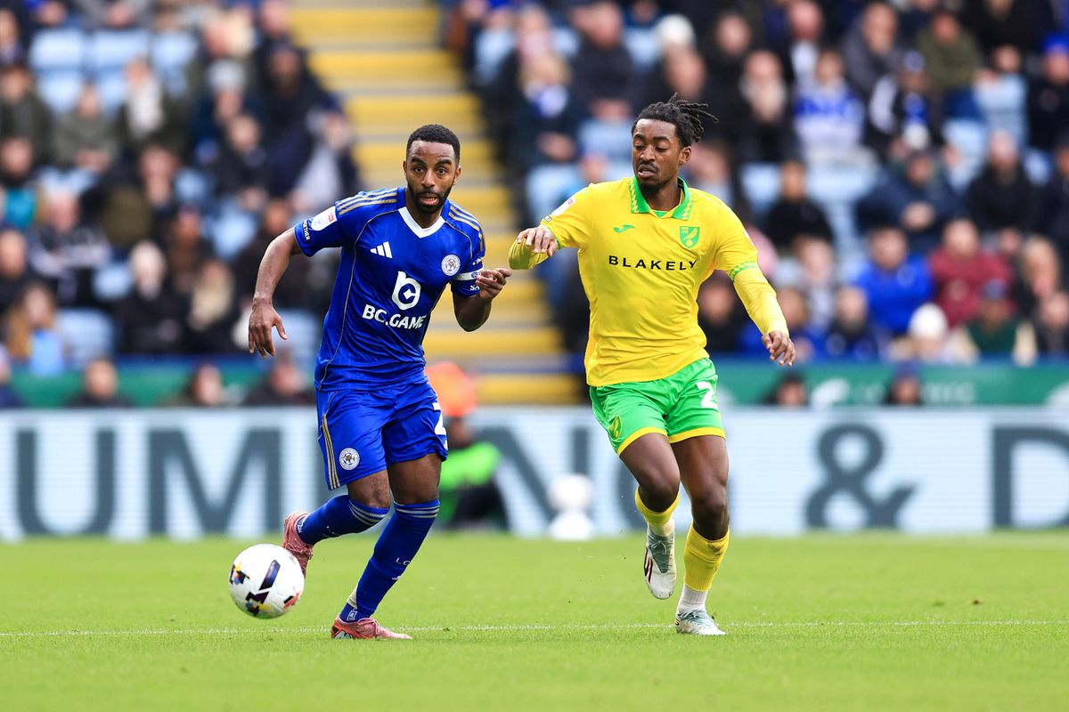 Ricardo Pereira of Leicester City is challenged by Paris Maghoma of Norwich City
